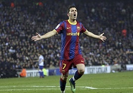 David Villa celebra un tanto con la camiseta del FC Barcelona.