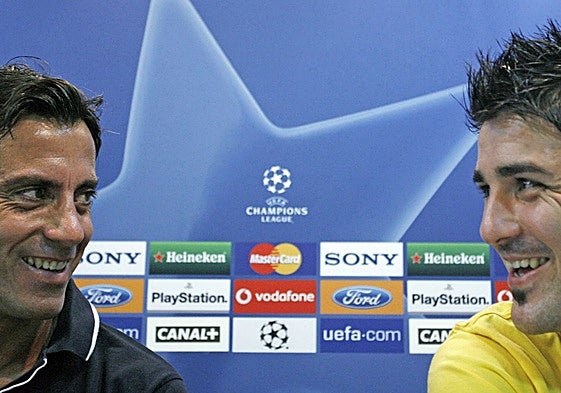 Quique Sánchez Flores y David Villa, en su época en el Valencia.