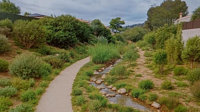 Imagen después - El barranco de los Olmos y la transformación que se pretende a la derecha.