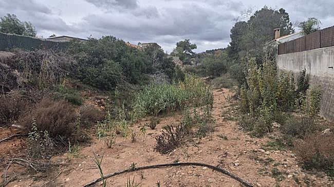 Imagen antes - El barranco de los Olmos y la transformación que se pretende a la derecha.