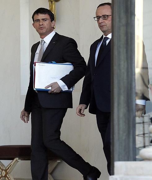 Manuel Valls y Francçois Hollande. 