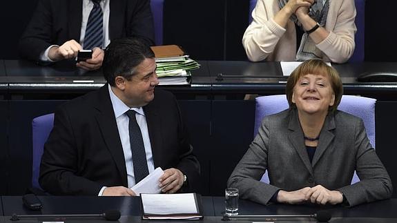 Sigmar Gabriel y Angela Merkel.
