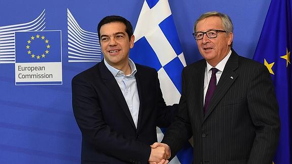 Jean-Claude Juncker y Alexis Tsipras.  