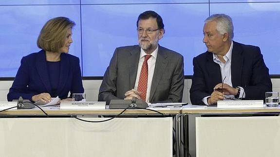 De izq. a dcha., Cospedal, Rajoy y Arenas, durante el Comité Ejecutivo del PP. 