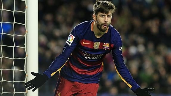 Piqué celebra un gol ante el Espanyol. 