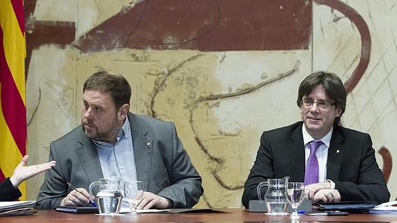 Oriol Junqueras y Carles Puigdemont.