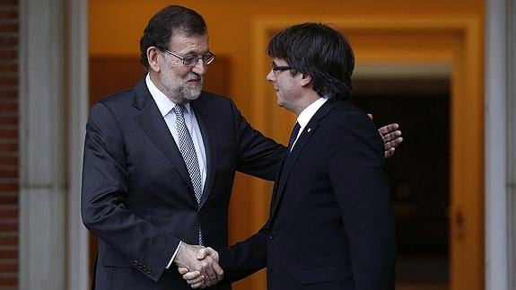 Mariano Rajoy y Carles Puigdemont.