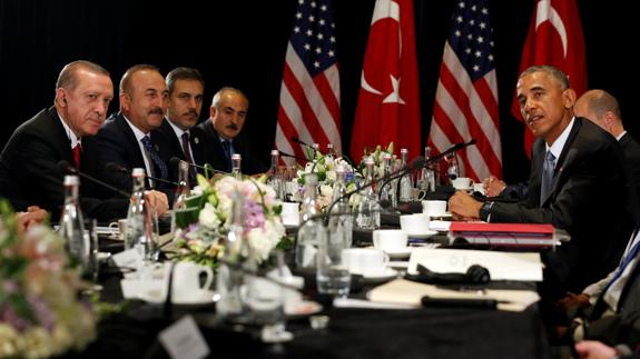 Barack Obama frente a Recep Tayyip Erdogan en China.