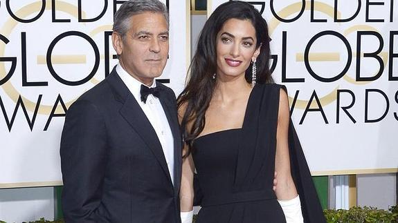 George Clooney y Amal Alamuddin, en la 72 edición de los Globos de Oro. 