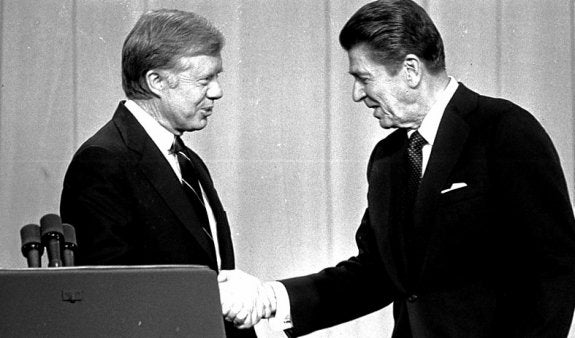 Carter y Reagan en 1980. Arriba, Kennedy y Nixon, los pioneros. 