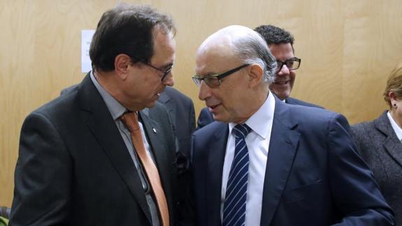 El conseller Soler y el ministro Montoro, en una imagen de archivo.