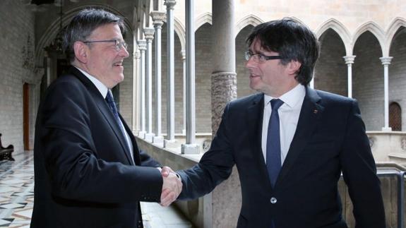 Puig y Puigdemont durante un encuentro en Barcelona.