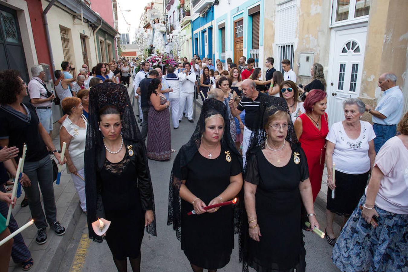 El Raval Roig celebra la procesión de la Virgen del Socorro