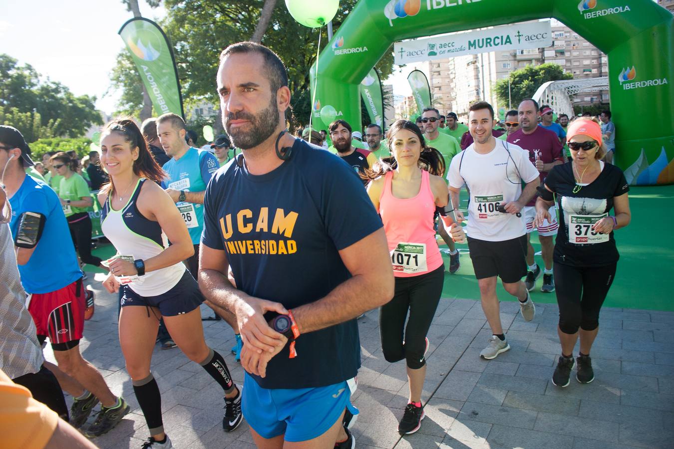 Una marea verde recorre el centro de Murcia para luchar contra el cáncer