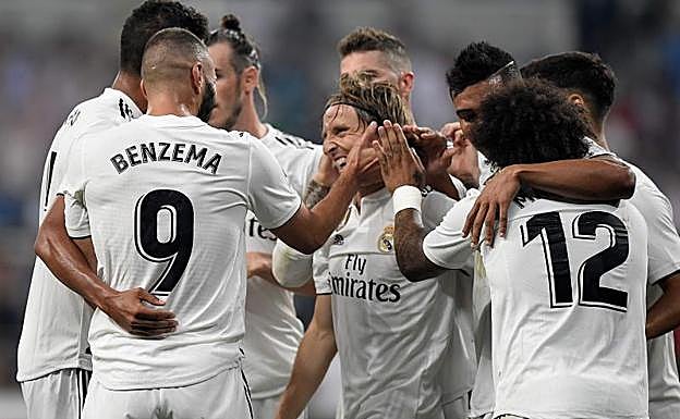 El Real Madrid celebrando el tercer gol del equipo