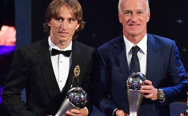 Luka Modric y Didier Deschamps. 