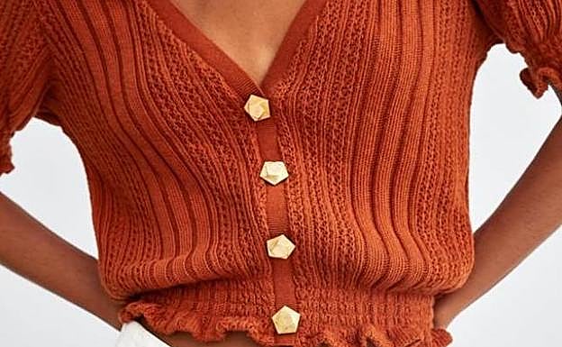 Chaqueta cropped en naranja tostado 17,95€ 