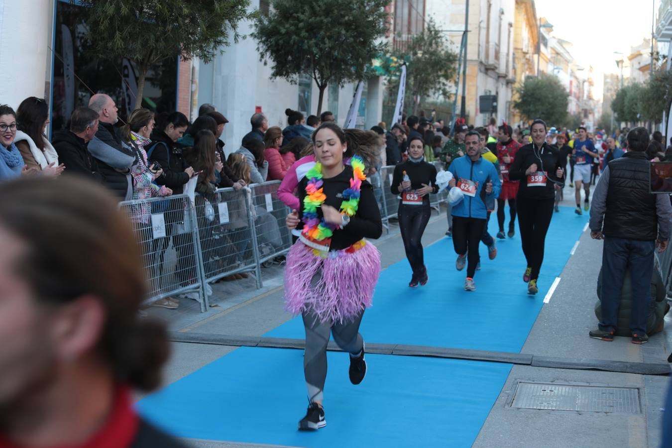 Casi un millar de corredores despiden el año disfrutando del deporte en la Ciudad del Sol por una buena causa