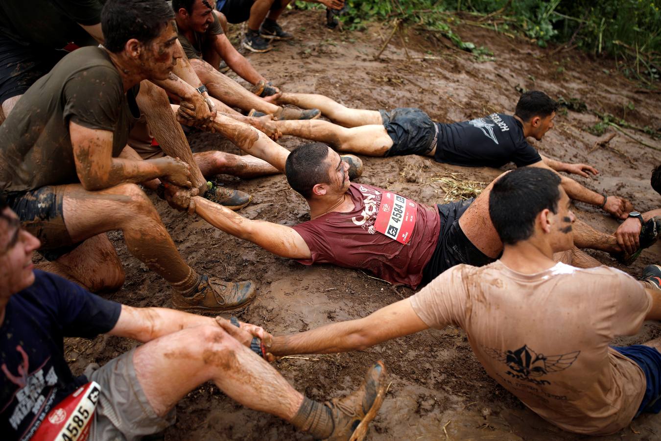 Miles de corredores participan en la Carrera de Barro de Tel Aviv celebrada en el Parque Yarkon de Tel Aviv, Israel. Más de 6.000 personas se dan cita cada año en la competición.