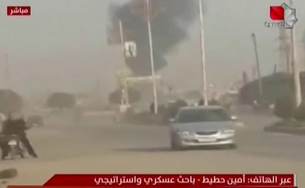 Imagenes de televisión del ataque de Turquía sobre posiciones kurdosiras, en el norte Siria.