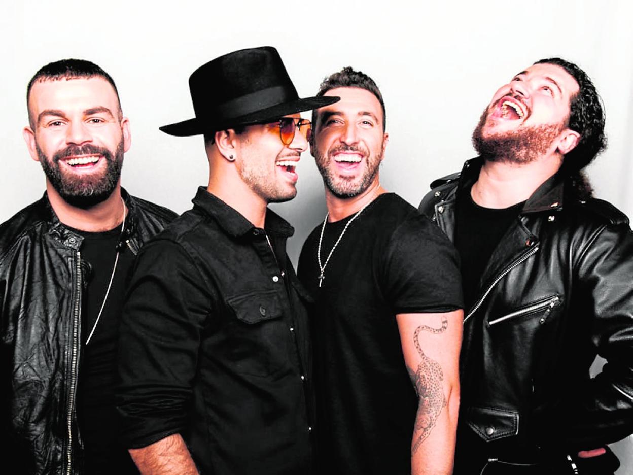 Los miembros de Efecto Pasillo en una fotografía promocional. 