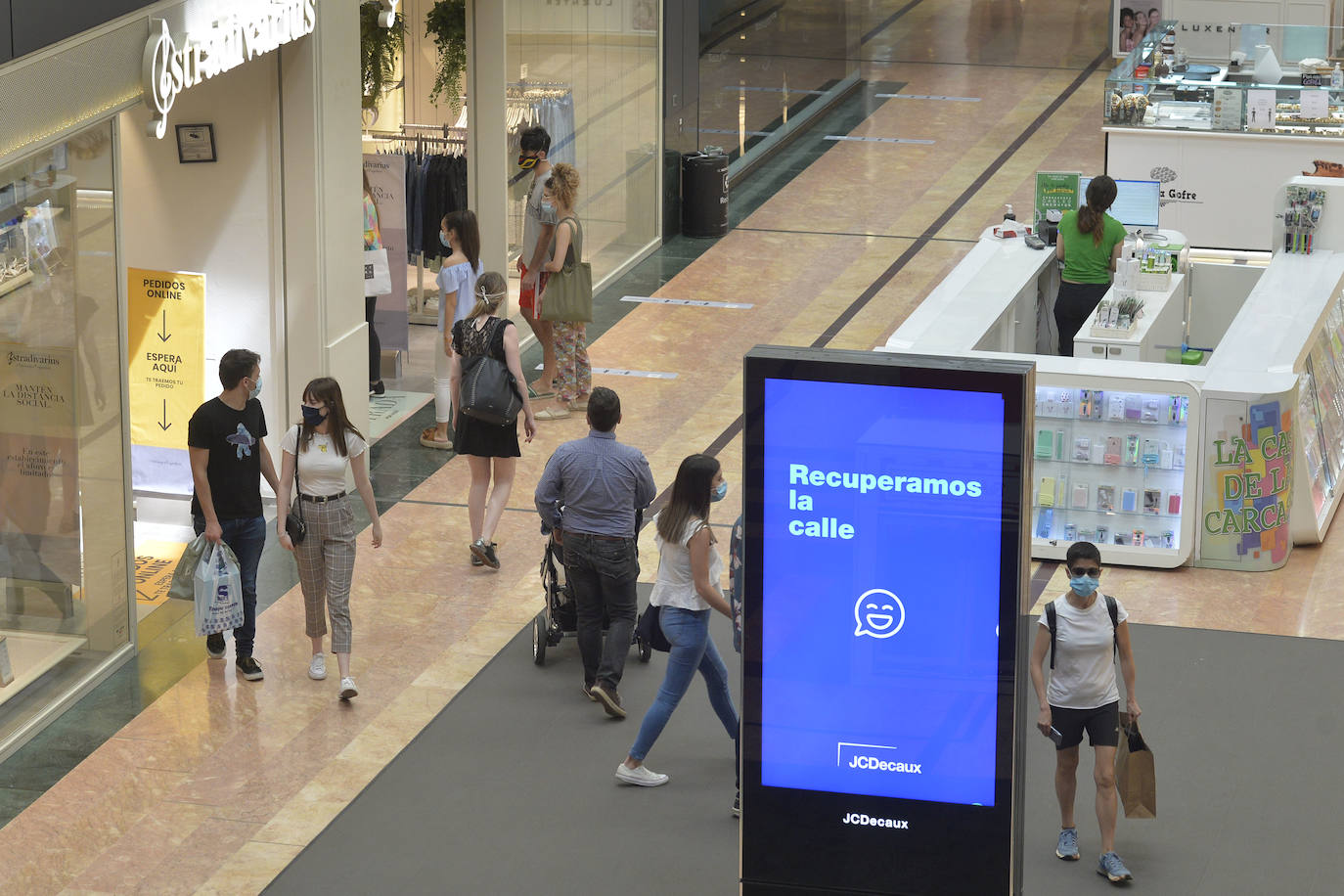 Fotos: Los centros comerciales vuelven tras más de dos meses