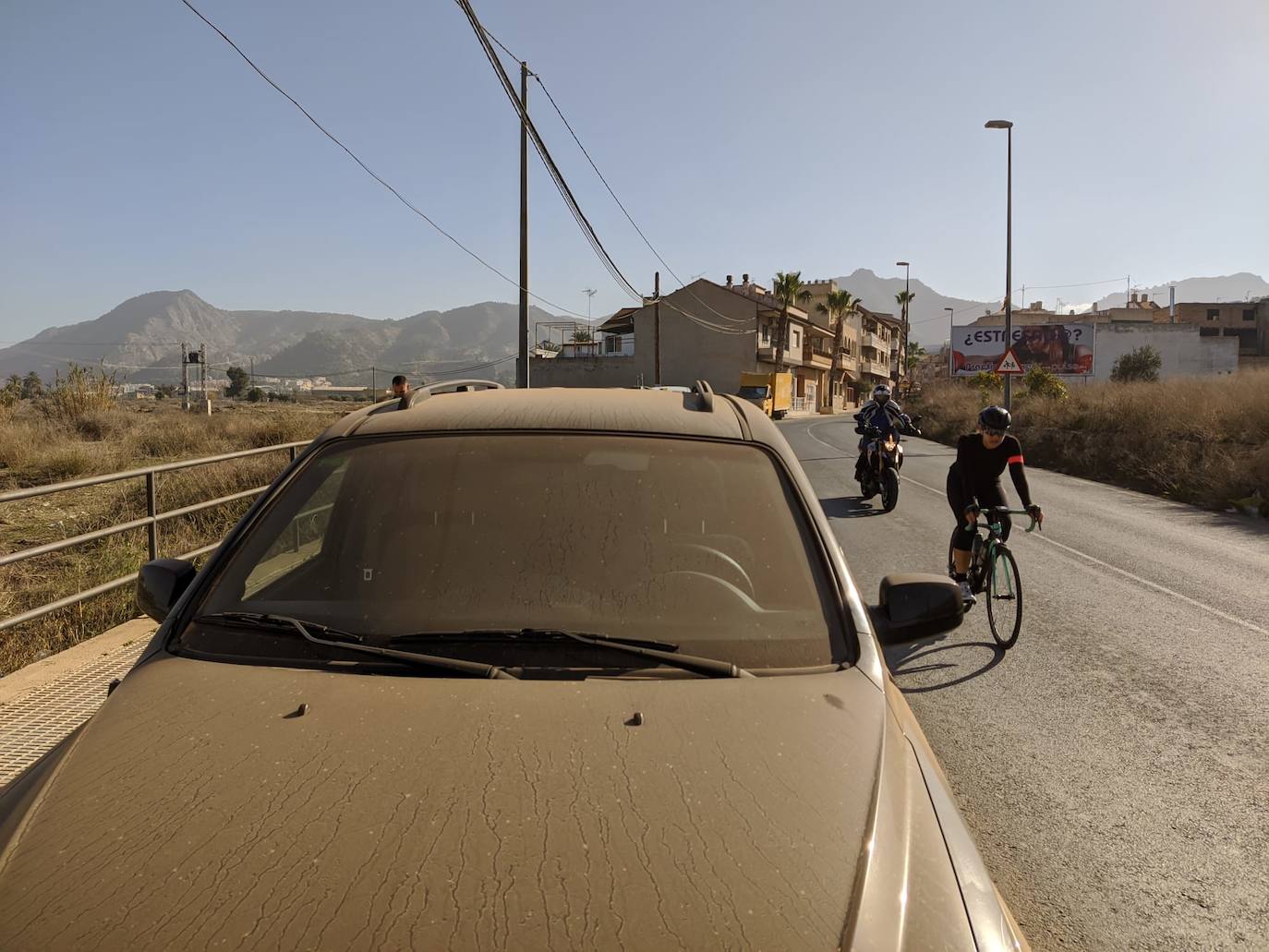 Fotos: El polvo africano cubre coches y calles de la Región de Murcia