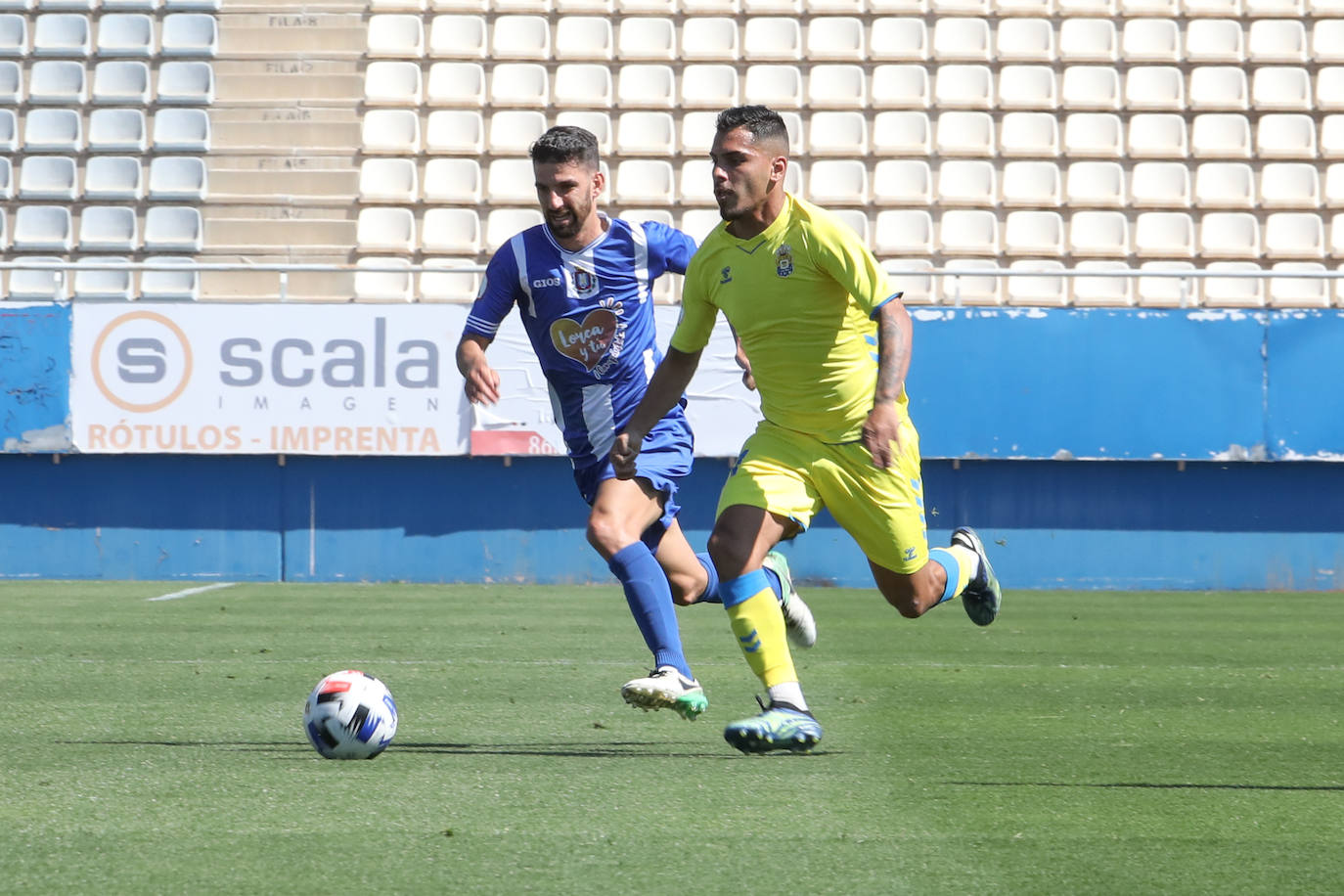 Fotos: Justo reparto de puntos para el Lorca en un partido de trámite