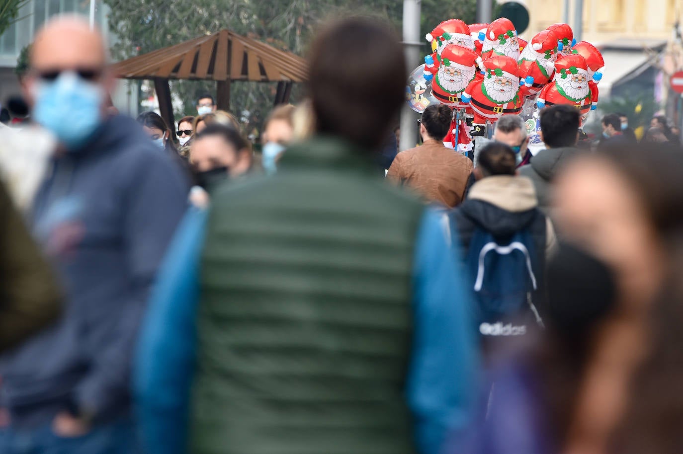 Fotos: Las mascarillas vuelven a las calles de la Región de Murcia por Navidad