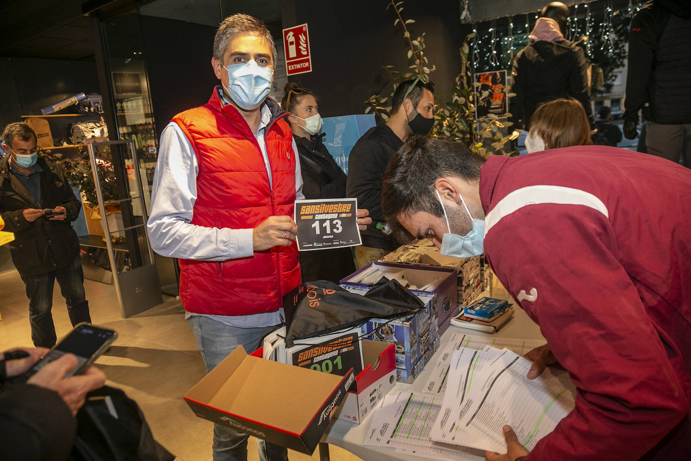 Fotos: Recogida de dorsales de la San Silvestre de Cartagena