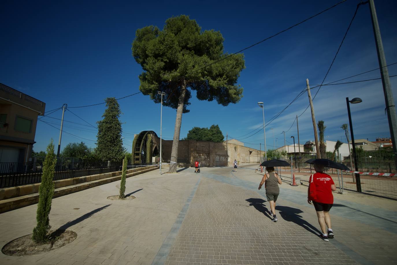 Fotos: La renovación del entorno de la rueda de La Ñora, en imágenes