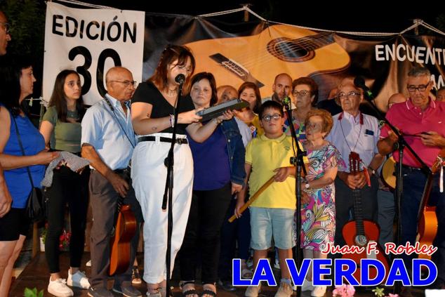 El pasado sábado, 30 de julio del 2022, en la explanada junto al Restaurante El Cortijo, en el Campo de San Juan, se celebró el XXX ENCUENTRO DE CUADRILLAS DE ANIMEROS EN EL NOROESTE MURCIANO. Las cuadrillas invitadas empezaron a llegar y a hacer música mientras se hacía la hora de degustar una merienda/cena que se les ofreció a las mismas. A continuación tuvo lugar el homenaje a Salvador Ondoño López, fallecido hace solo unos días.