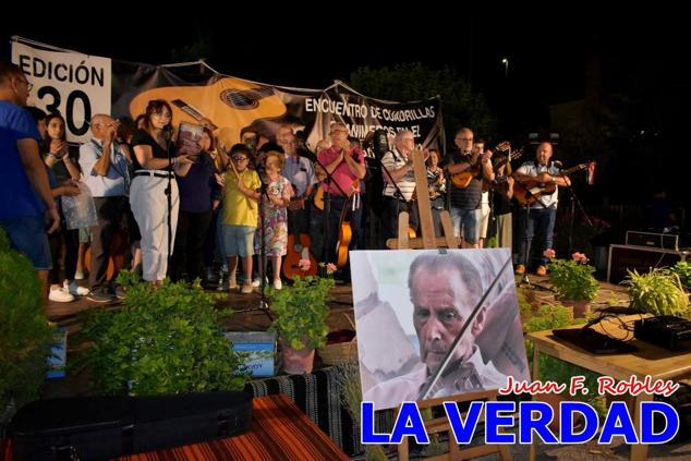 El pasado sábado, 30 de julio del 2022, en la explanada junto al Restaurante El Cortijo, en el Campo de San Juan, se celebró el XXX ENCUENTRO DE CUADRILLAS DE ANIMEROS EN EL NOROESTE MURCIANO. Las cuadrillas invitadas empezaron a llegar y a hacer música mientras se hacía la hora de degustar una merienda/cena que se les ofreció a las mismas. A continuación tuvo lugar el homenaje a Salvador Ondoño López, fallecido hace solo unos días.