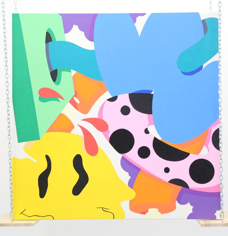 Cuadro pintado y colgado sobre un columpio.