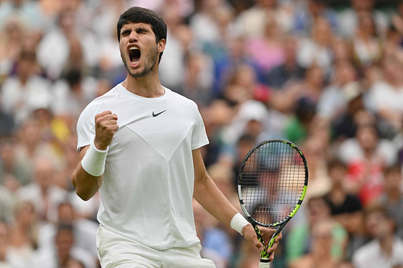 El partido entre Carlos Alcaraz y Jarry en Wimbledon, en imágenes