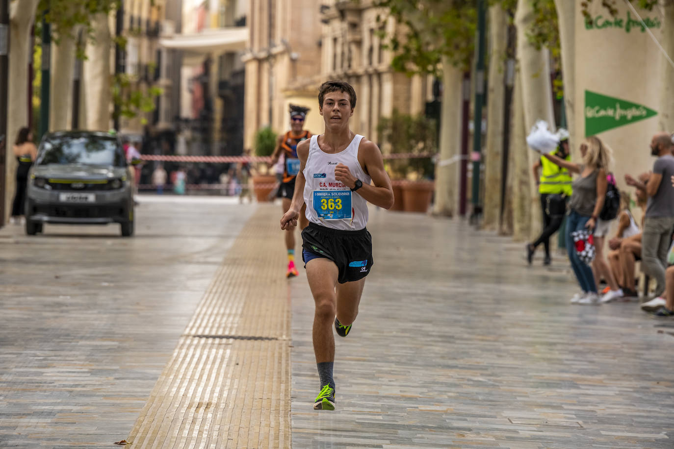 La I Carrera Solidaria Alfonso X de la Feria de Murcia, en imágenes