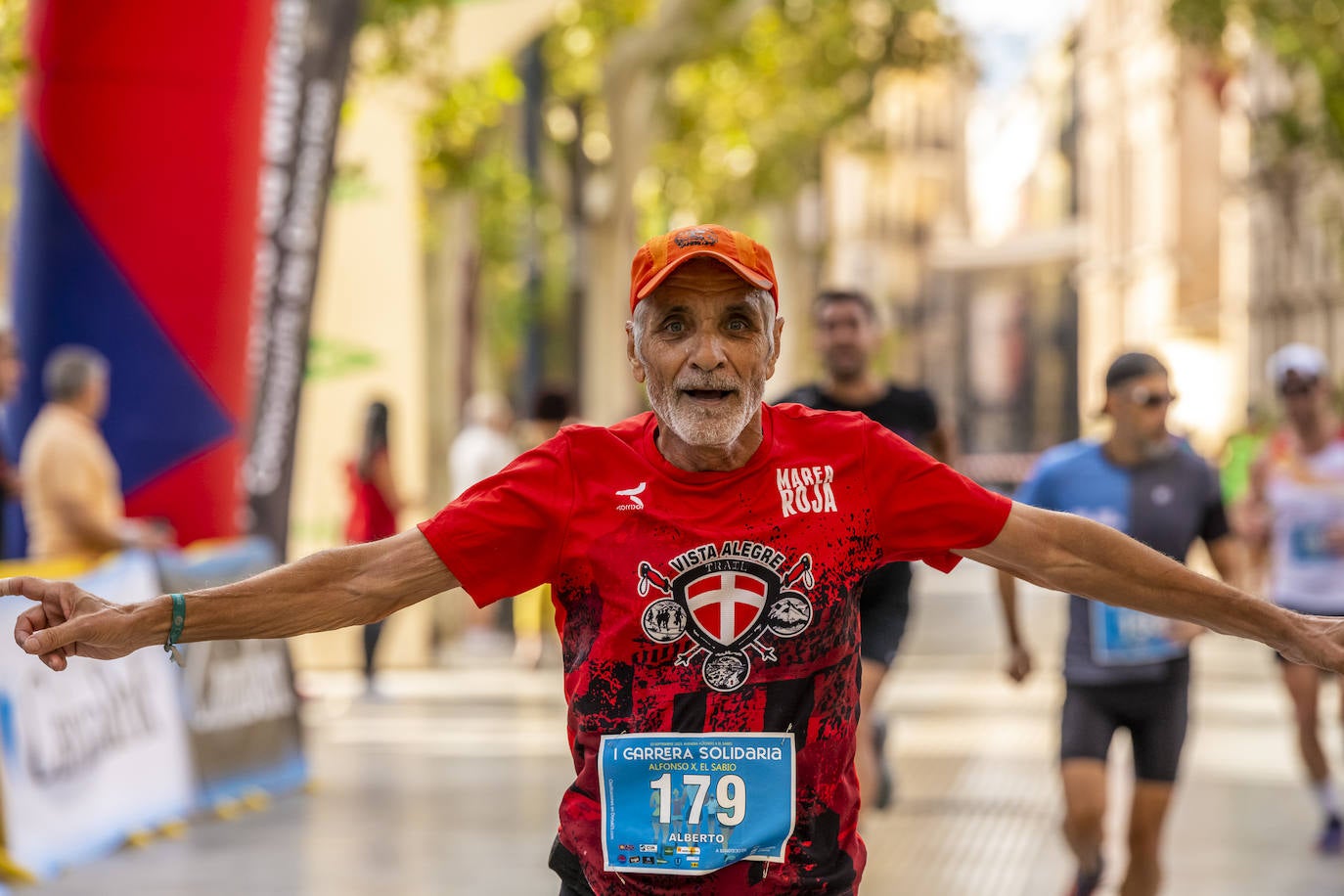 La I Carrera Solidaria Alfonso X de la Feria de Murcia, en imágenes