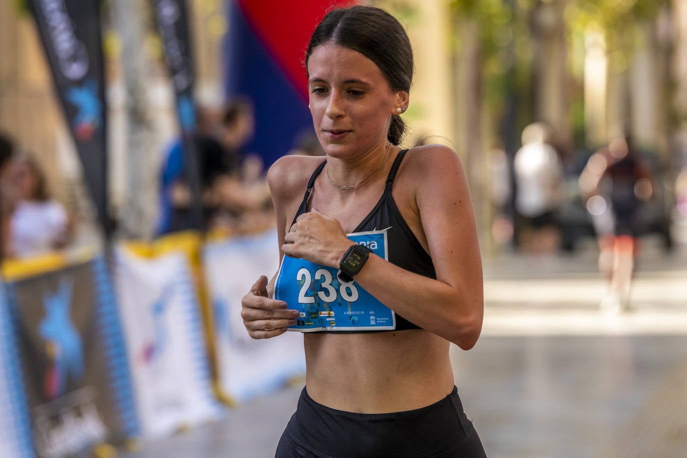 La I Carrera Solidaria Alfonso X de la Feria de Murcia, en imágenes