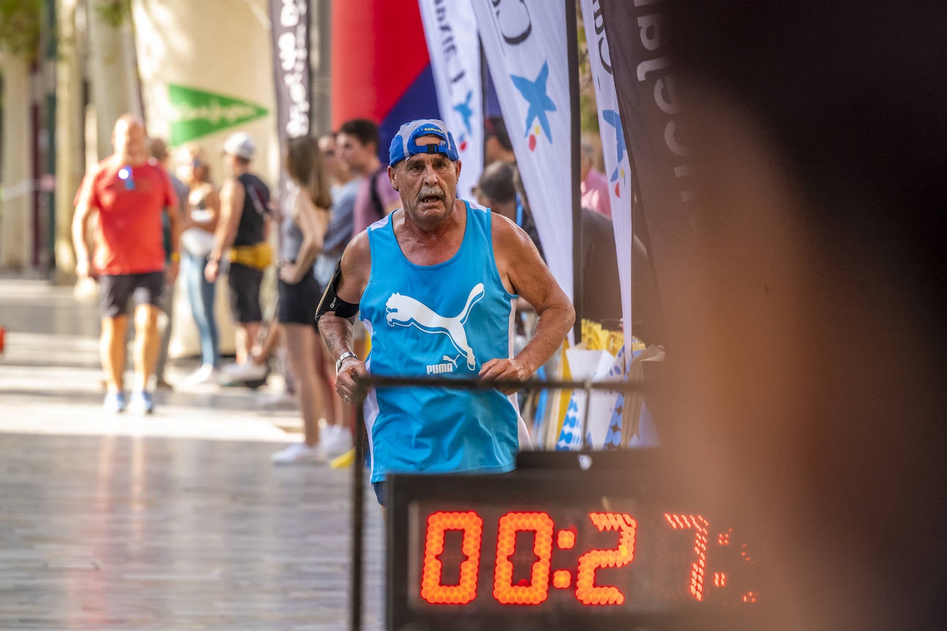 La I Carrera Solidaria Alfonso X de la Feria de Murcia, en imágenes