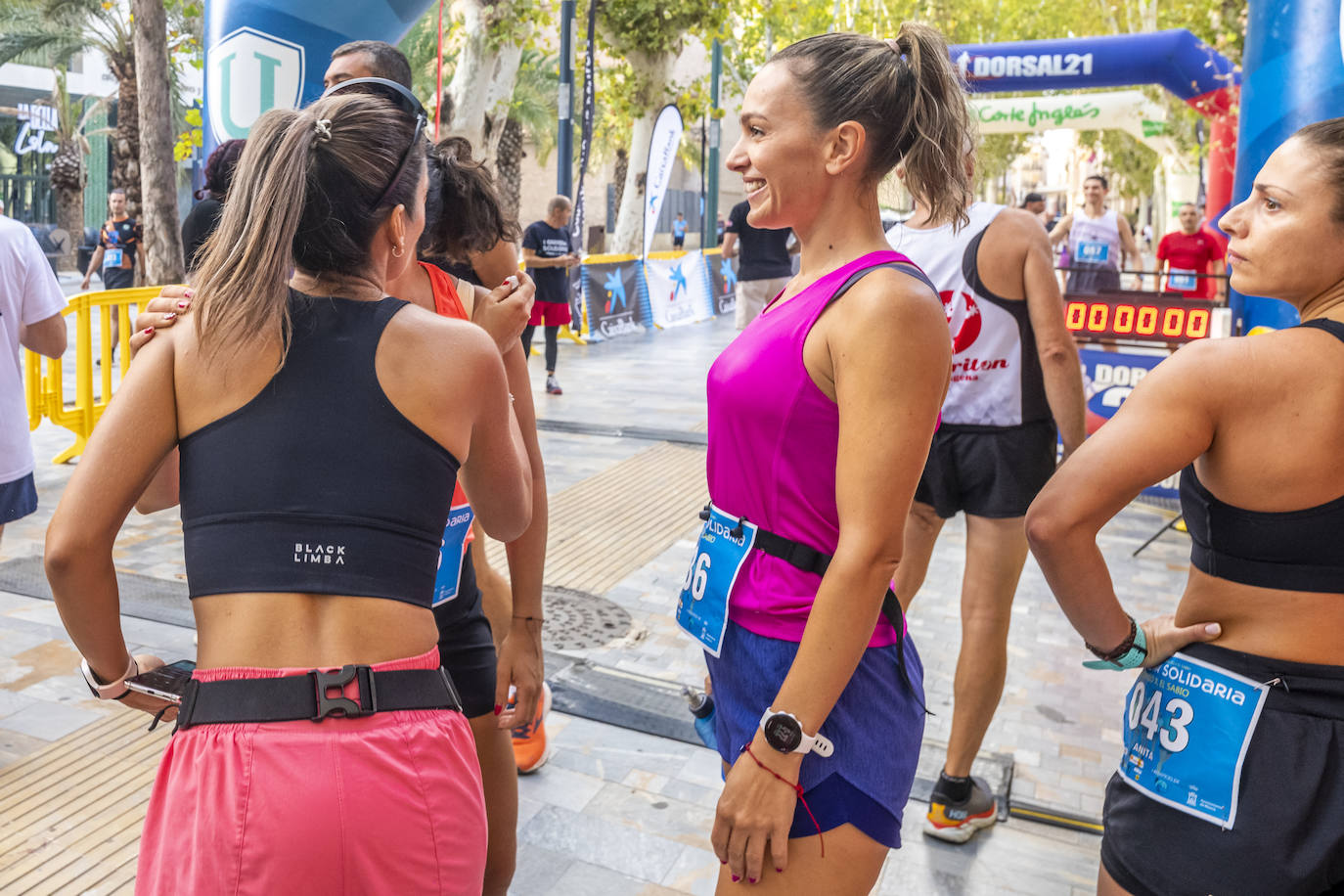 La I Carrera Solidaria Alfonso X de la Feria de Murcia, en imágenes