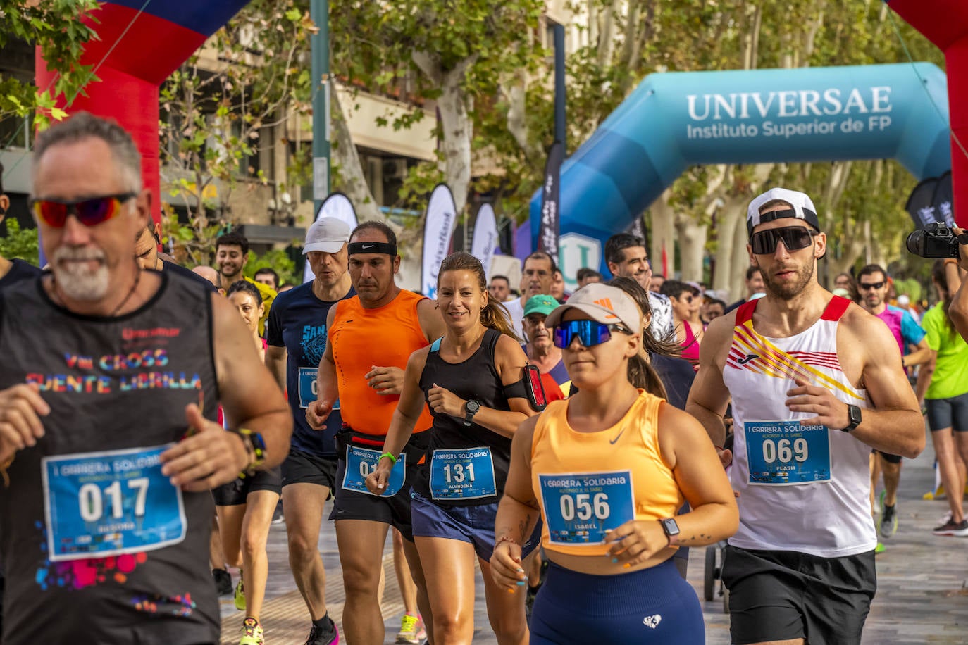 La I Carrera Solidaria Alfonso X de la Feria de Murcia, en imágenes