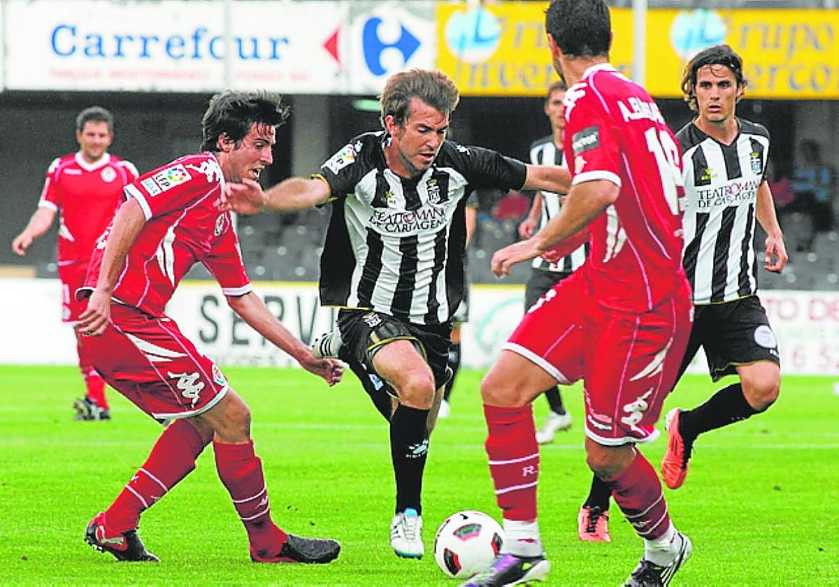 Longás y Toni Moral, en el Efesé-Valladolid de 2011.