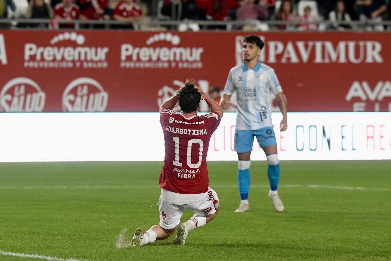 La derrota del Real Murcia frente al Málaga, en imágenes