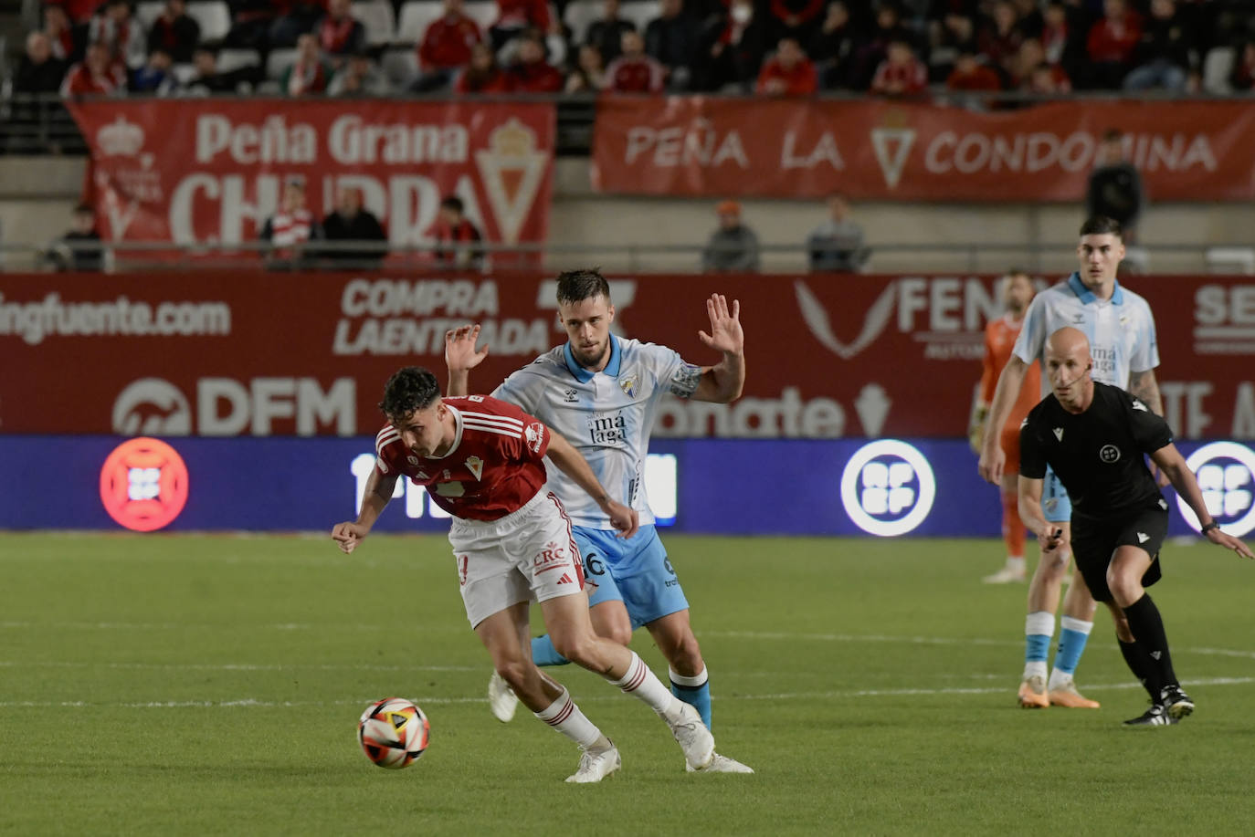 La derrota del Real Murcia frente al Málaga, en imágenes