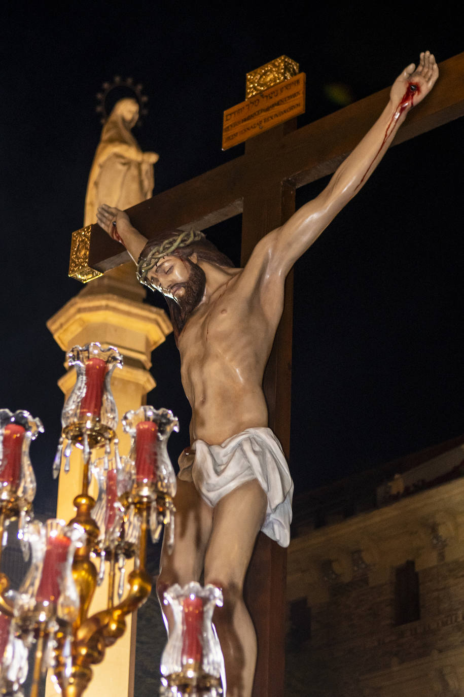 La procesión de la Caridad del Sábado de Pasión de Murcia, en imágenes