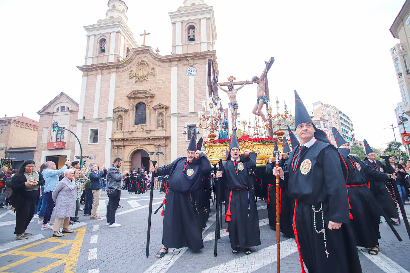 La procesión de la Soledad del Calvario de Murcia, en imágenes