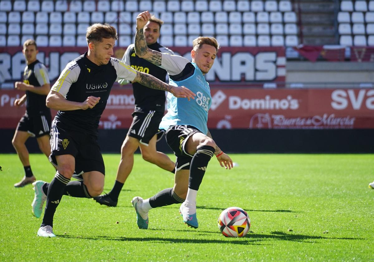 Loren Burón e Isi Gómez, en un entrenamiento.