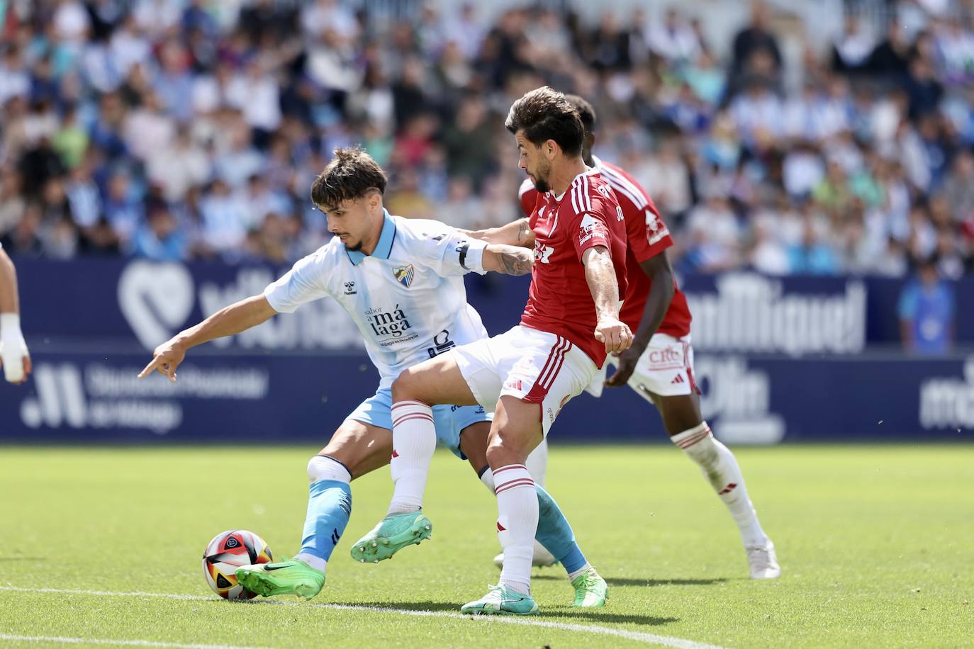 El empate del Real Murcia frente al Málaga, en imágenes