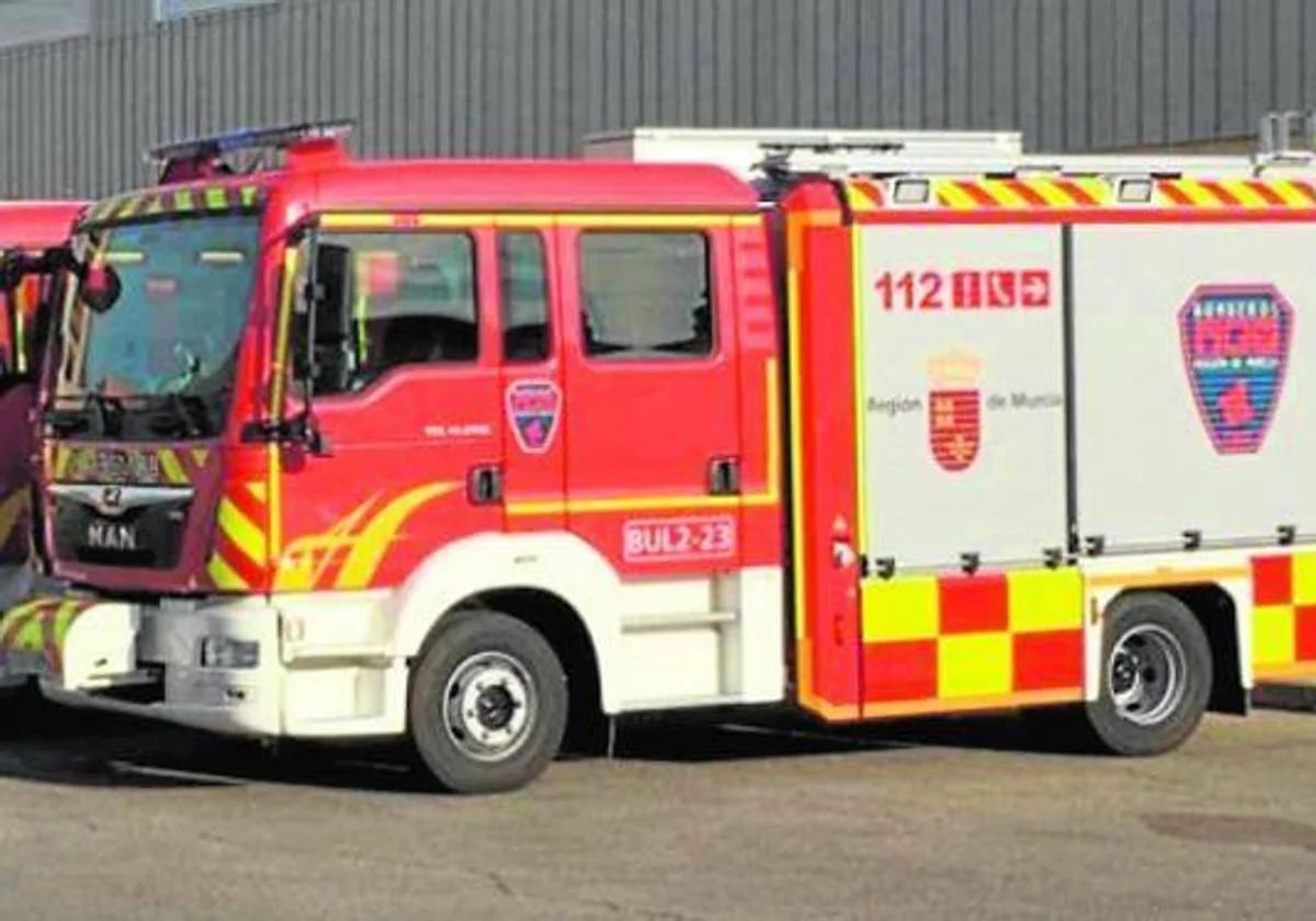 Un camión de bomberos en imagene de archivo.