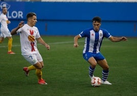 Dani Albiar (d.), en un partido con el Lorca Deportiva.